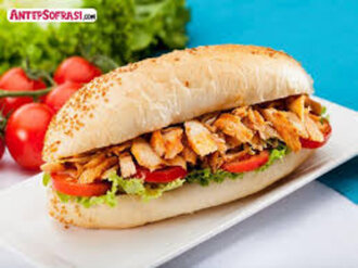 Sütlü Ekmeğe Tavuk Döner Dürüm görseli