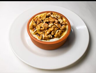 Güveçte Fıstıklı Fırın Sütlaç görseli