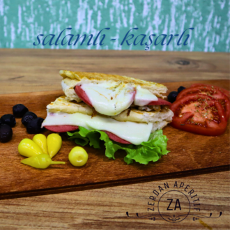 Yarım Ekmek Arası Salamlı Kaşarlı Tost görseli