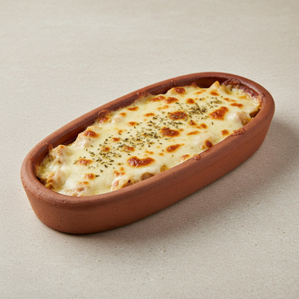 Kiremitte Kaşarlı Tavuk görseli