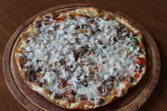 Kuşbaşılı Kaşarlı Lahmacun görseli