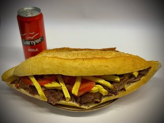 Tam Ekmek Et Döner + Sarıyer Kola görseli
