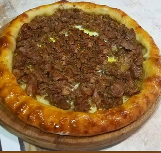 Kavurmalı Kaşarlı Bafra Pidesi (Yuvarlak) görseli