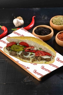 Menü 32 Ekmek Arası Kavurma Kola + Tatlı görseli