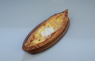 Tavuklu Kaşarlı Yumurtalı Pide görseli