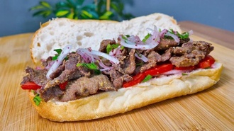 Ekmek Arası Ciğer (150 G) + Coca Cola (250 Ml.) görseli