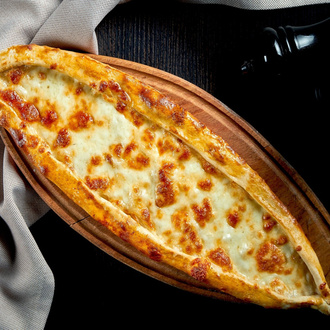 Kaşarlı Yumurtalı Karadeniz Pide görseli