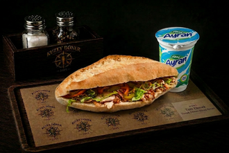 1 Tam Ekmek Arası Tavuk Döner (160 Gr.) + Sütaş Ayran (27,5 Cl.) görseli