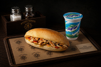 1 Adet Yarım Ekmek Arası Tavuk Döner (70 Gr.) +Sütaş Ayran (27,5 Cl.) görseli