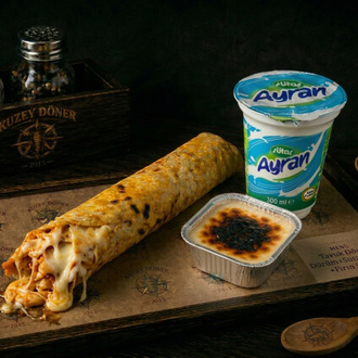Kaşarlı Tavuk Döner Dürüm Menü (275 Ml Ayran + Fırın Sütlaç) görseli