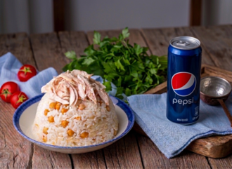 Tereyağlı Nohutlu Tavuk Pilav ( Orta Boy + 330 Ml Pepsi Cola ) görseli